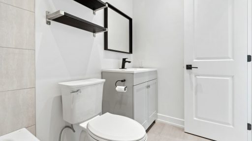 a bathroom with a toilet and sink